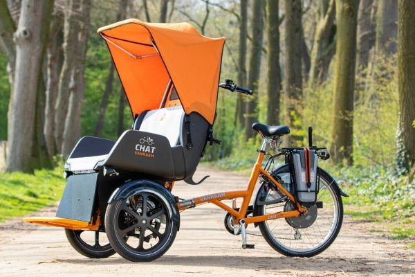 Chat rickshaw bike with canopy by Van Raam