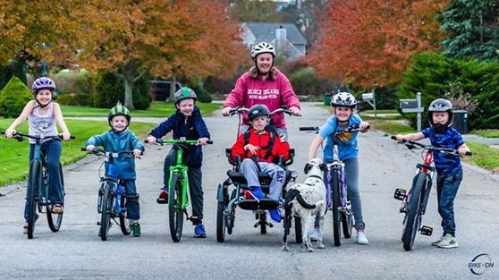 OPair elektrische rolstoelfiets Van Raam familie Ford