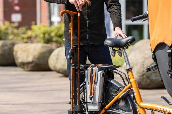 Stokhouder fiets riksja Chat Van Raam