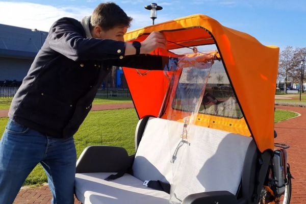 video chat rickshaw bike with intermediate shield mount