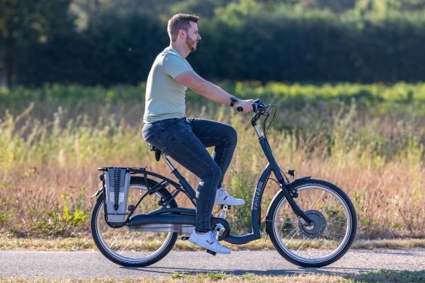 Balance bicycle with low entry and backpedal brake