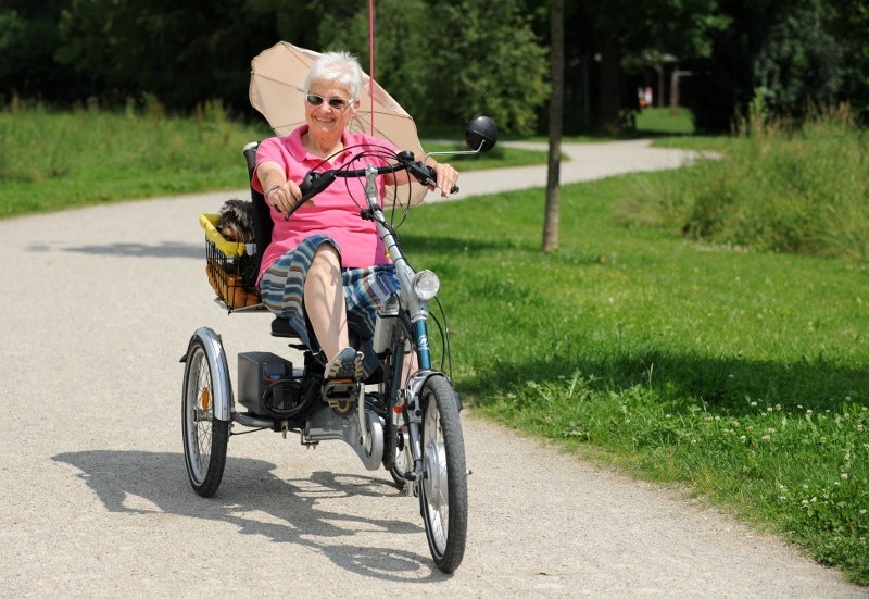 Gunda Krauss cycles on her Easy Rider tricycle