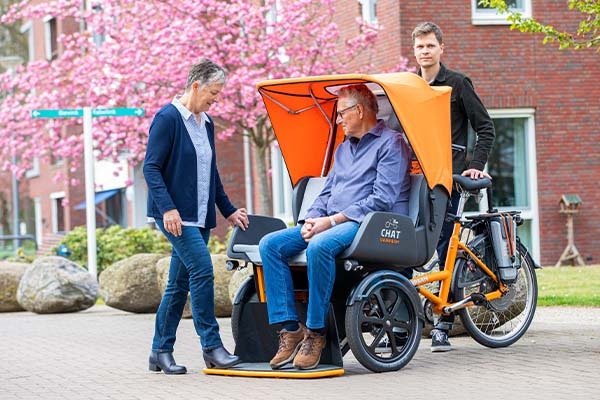 6 voordelen van een driewielfiets met bijrijderszitting Van Raam transportfiets Chat neerklapbare voetenplaat