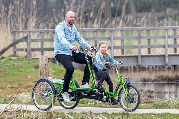 kivo plus three wheel tandem cycling together with a person with limited mobility van raam