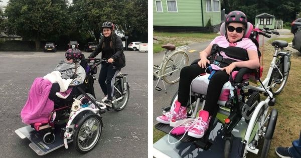 Child as a passenger on Van Raam VeloPlus wheelchair transport bike