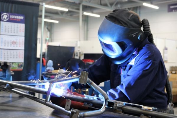 Welder at manufacturer of special needs bikes Van Raam