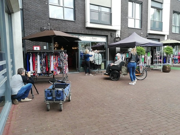 Rickshaw cargo bike Chat photo shoot Van Raam shopping street