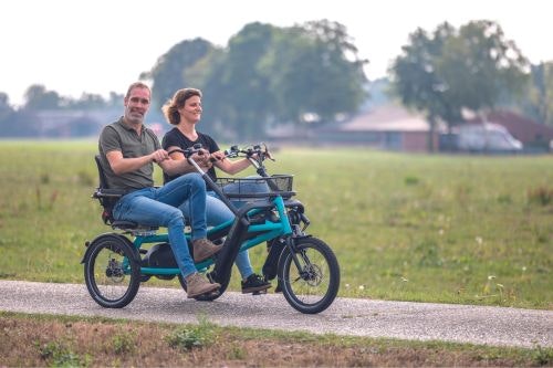 Fun2Go duo bike together with one leg on bicycle Van Raam