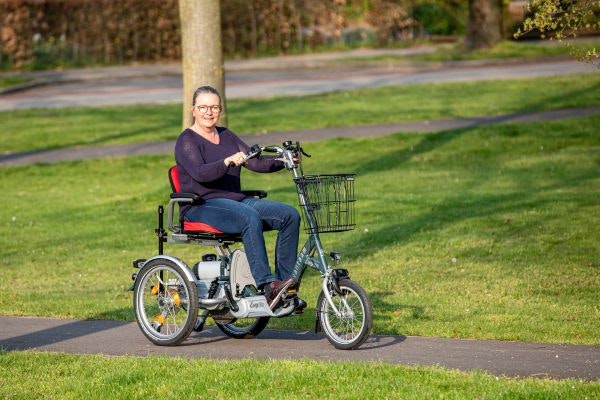 Elektromobil Dreirad fuer Personen mit einer Behinderung
