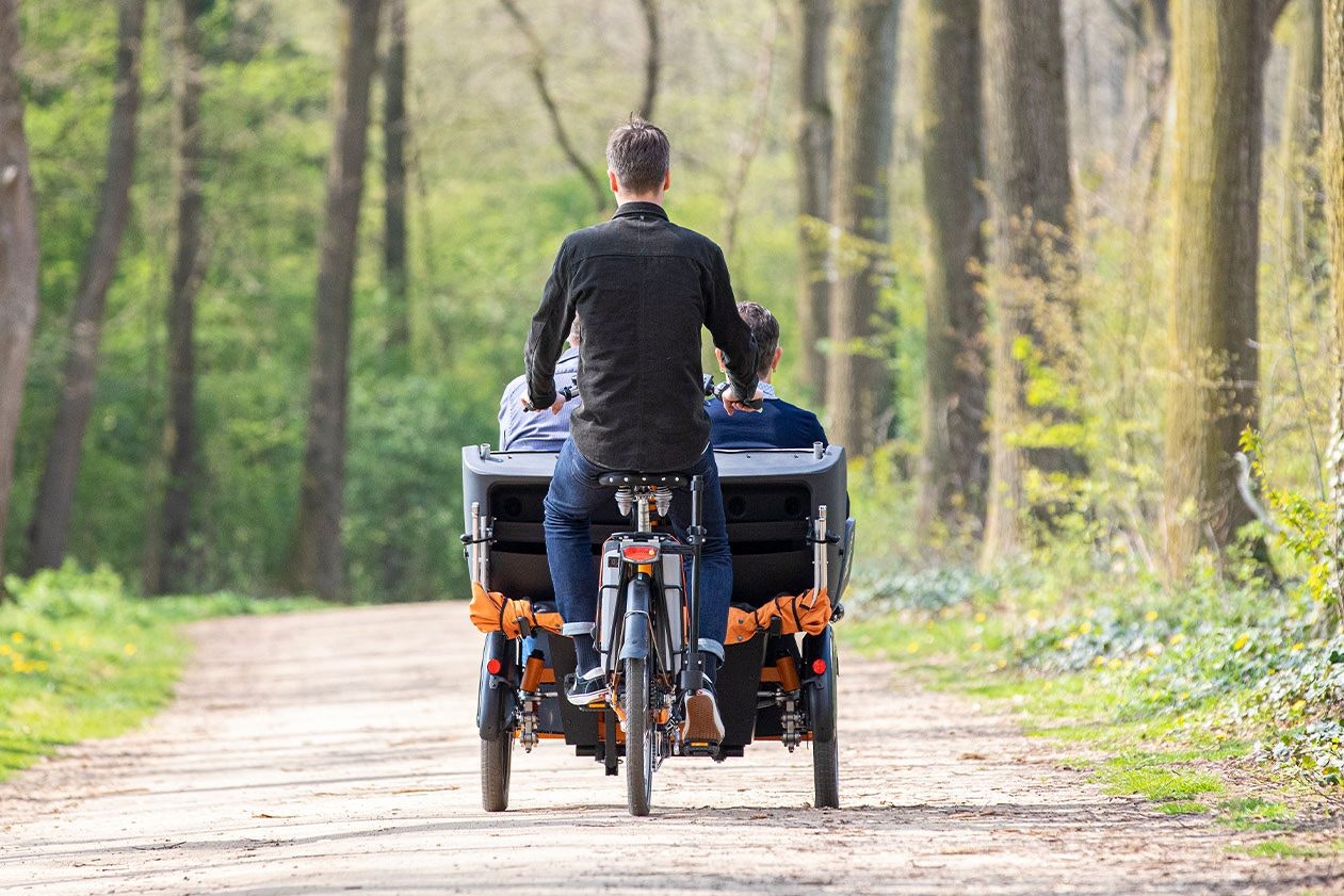 Cycling with rickshaw transport bike Chat Van Raam