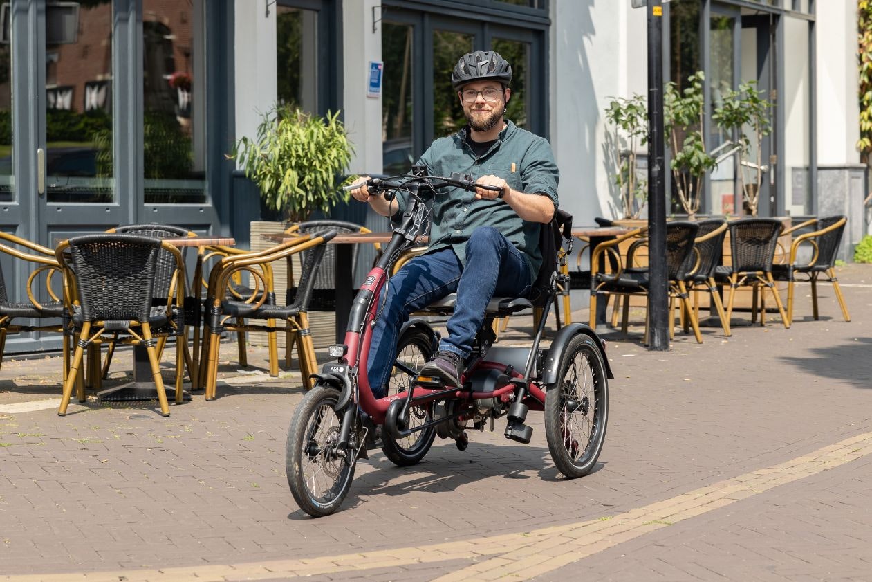 Mobiel blijven met een van raam driewielfiets Mobiel blijven met een van raam driewielfiets