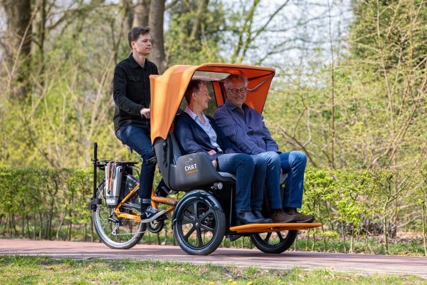 Chat riksja transportfiets Van Raam aangepaste fietsen