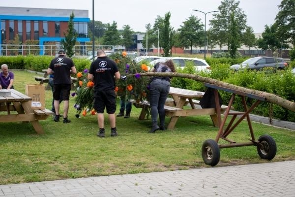 decorating maypole at Van Raam new factory hall