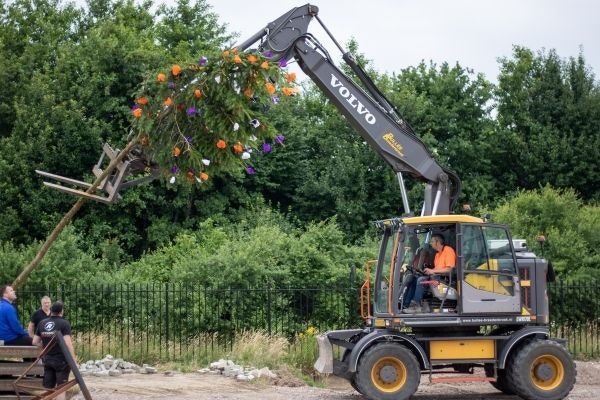 maypole being placed at new factory hall Van Raam