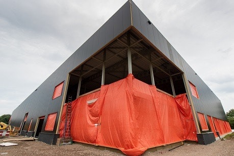 van raam extension covered with tarpaulin