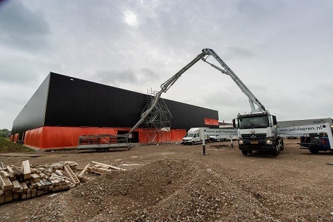 Pouring concrete extension Van Raam Varsseveld