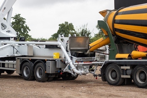 Pouring concrete for new hall of Van Raam