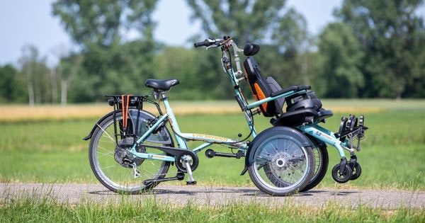 Child as a passenger on Van Raam's OPair wheelchair bike