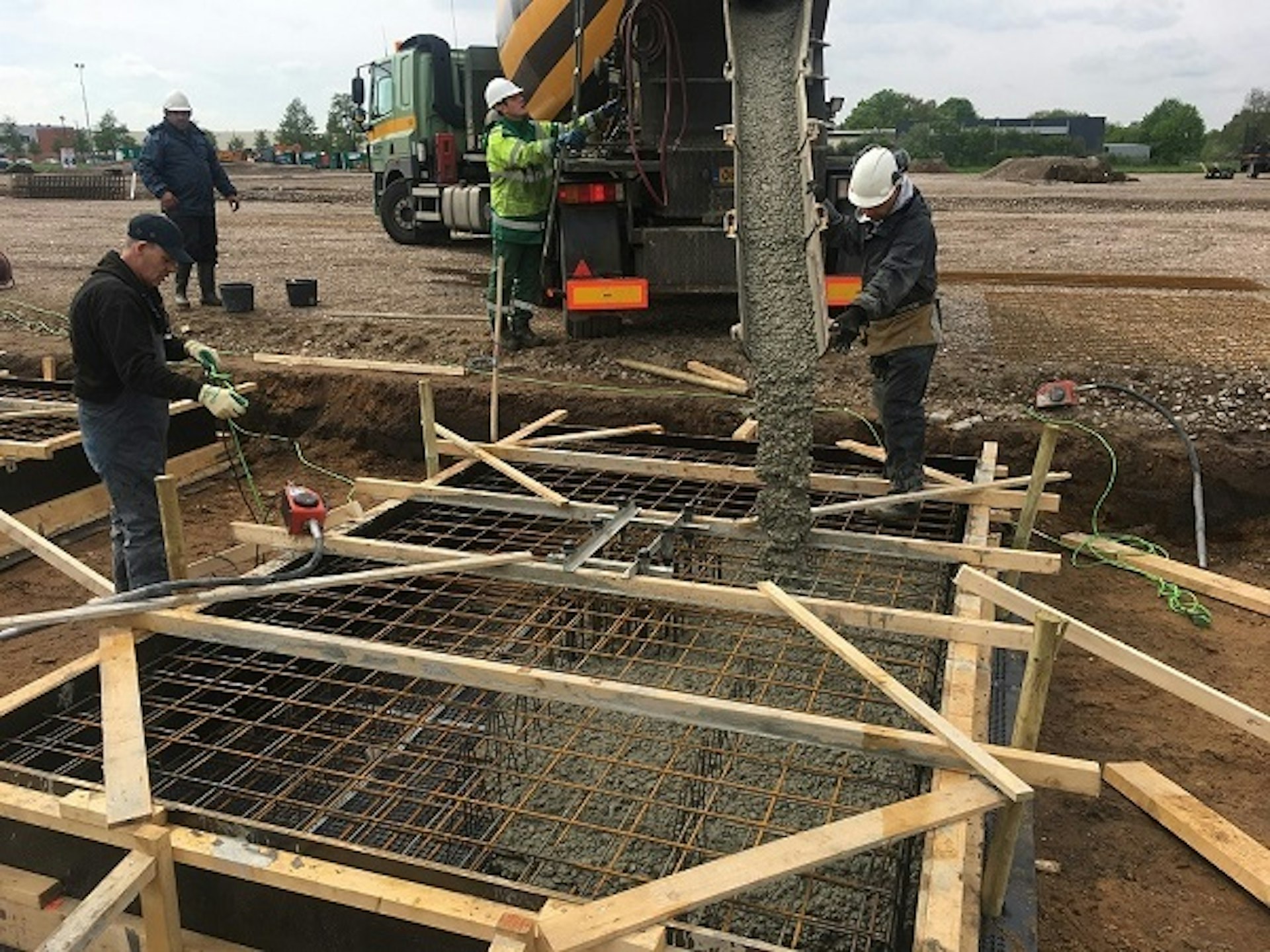 Week-18-foundation-poles-pouring-concrete