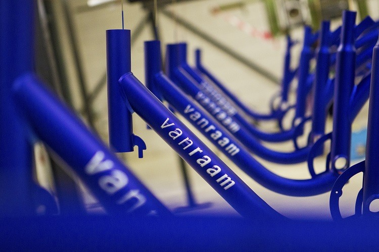 The bicycle frame with powder coating and stickers.