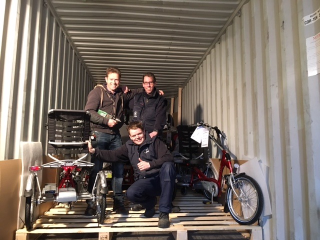 Van Raam employees loaded special needs bikes