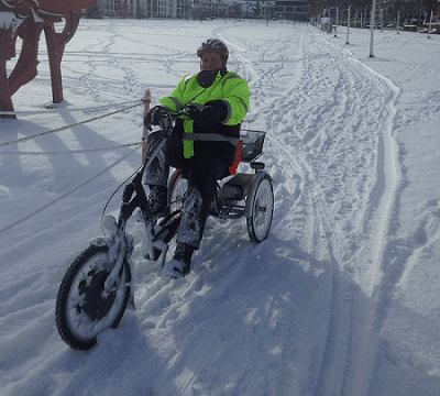 Easy rider tricycle cycling through snow
