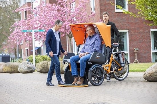 Van Raam electric rickshaw bike Chat with canopy