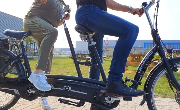 How do I get on a two-wheel tandem passenger