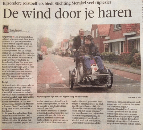 De wind door je haren op de rolstoelfiets 