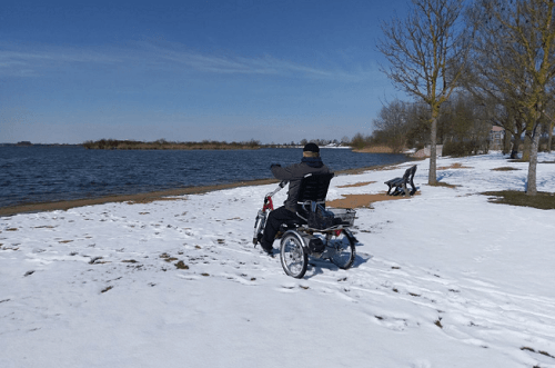 Tricycle Easy Rider by Van Raam cycling in the snow