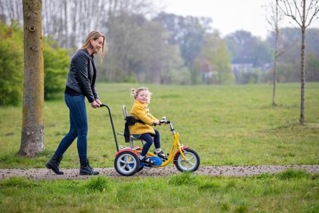 Van Raam tricycle for children making a test ride