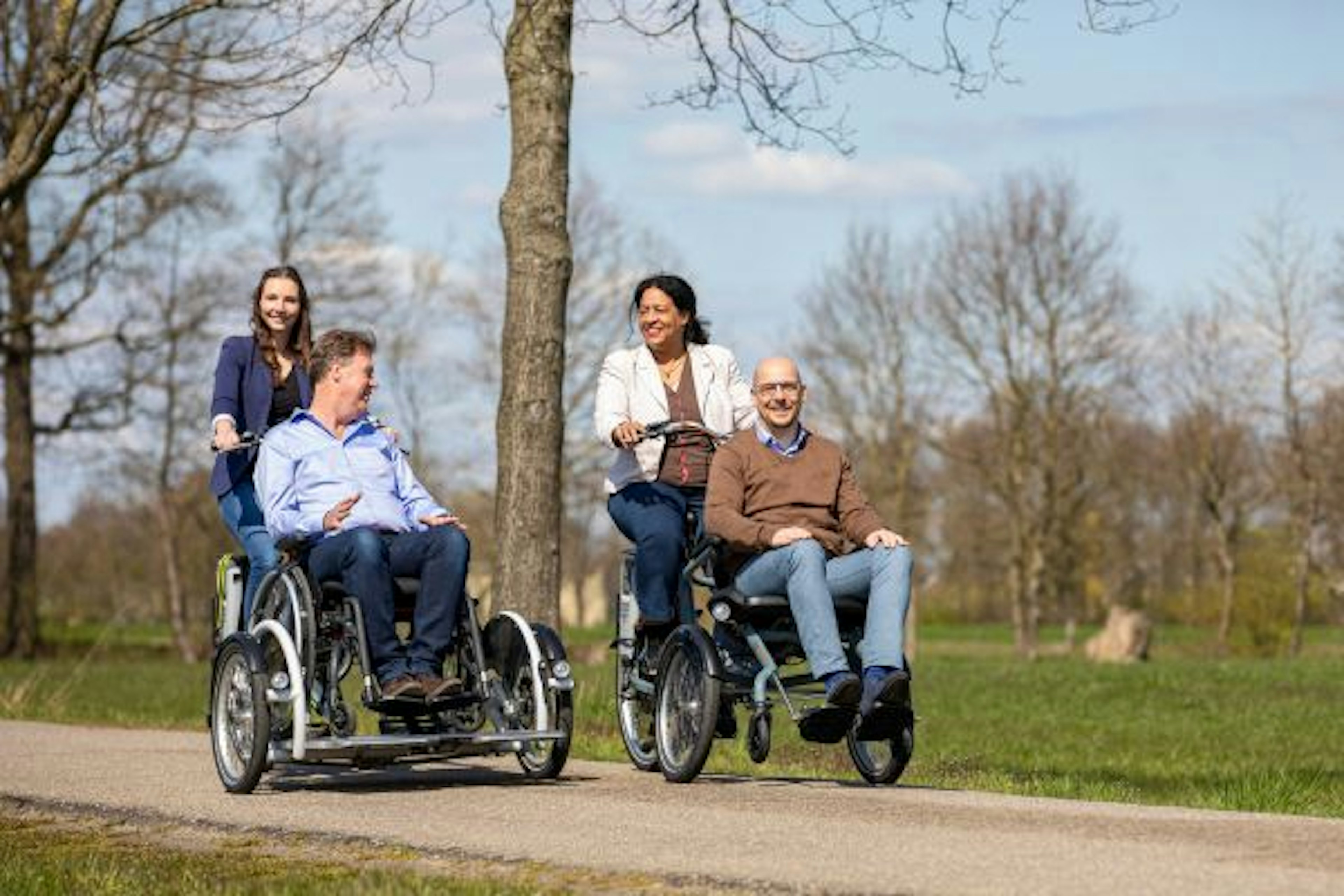 With three wheels for 2 persons wheelchair bicycles