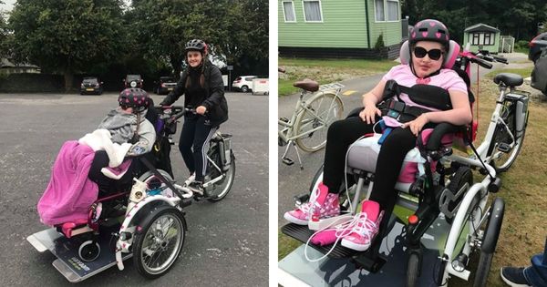 Kind als passagier mee met de VeloPlus rolstoeltransportfiets van Van Raam