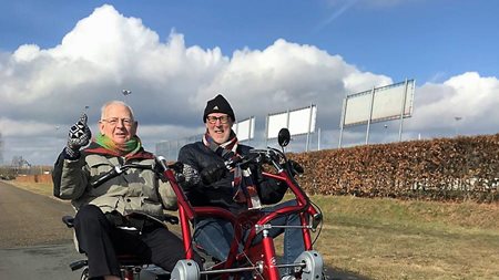 Side by side tandem aid agency De Goede Zorg