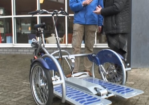 Test: elektrische rolstoelfiets rolstoeltransportfiets voor rolstoelvervoer.